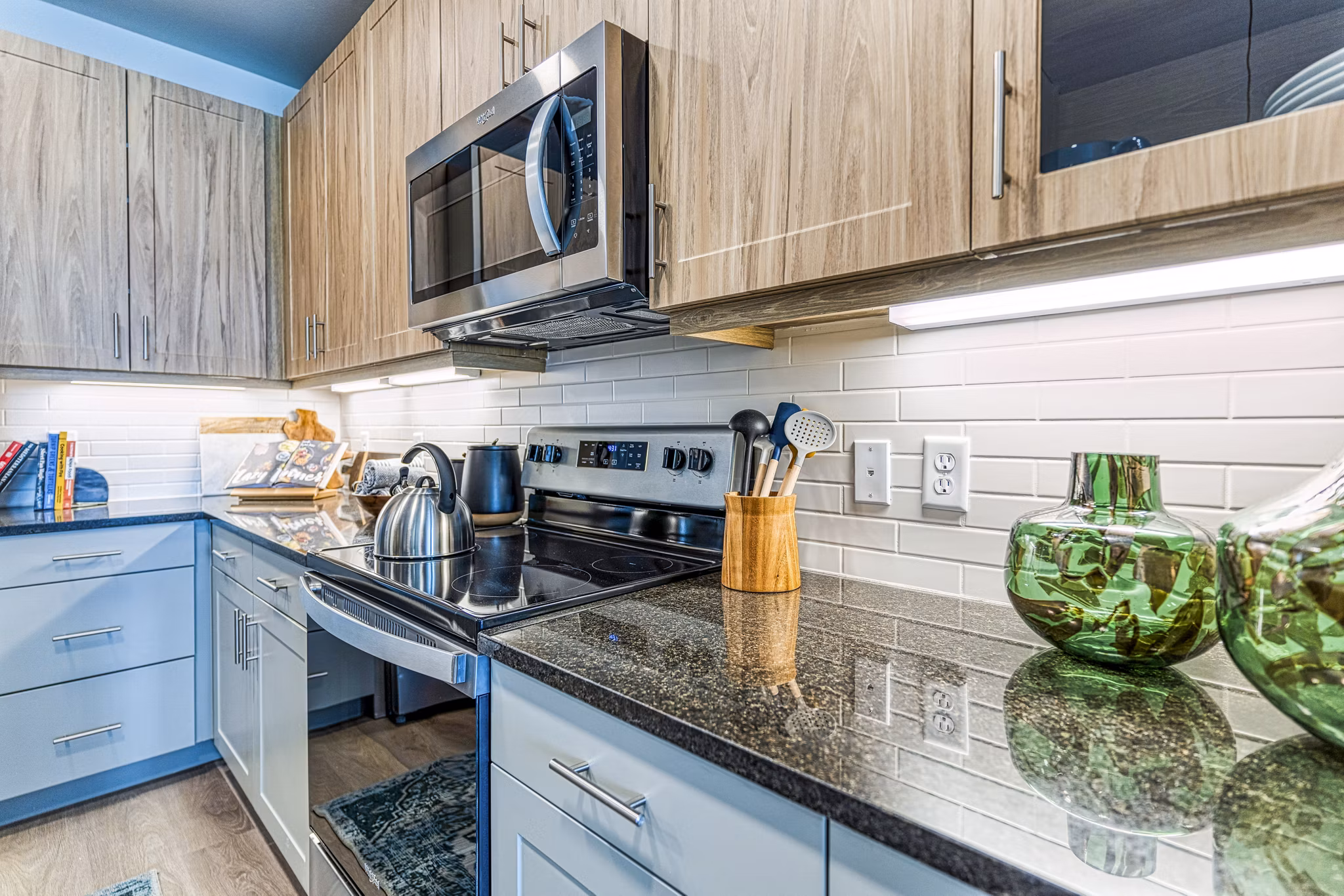 Modern kitchen with stainless steel appliances at The Banks of Springdale Apartments Ideal Greystar luxury living with practical elegance