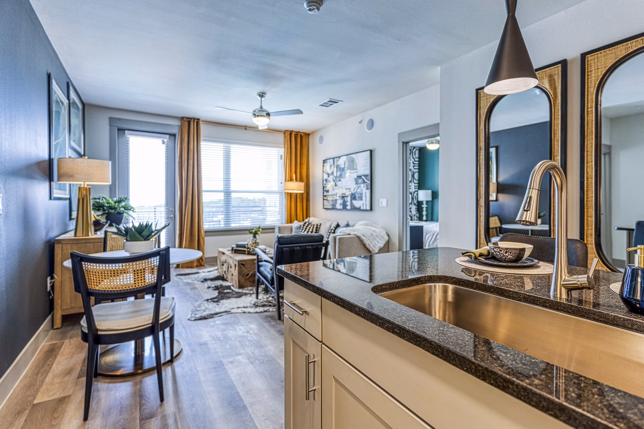 Modern kitchen with stainless steel appliances at The Banks of Springdale Apartments, offering luxury living