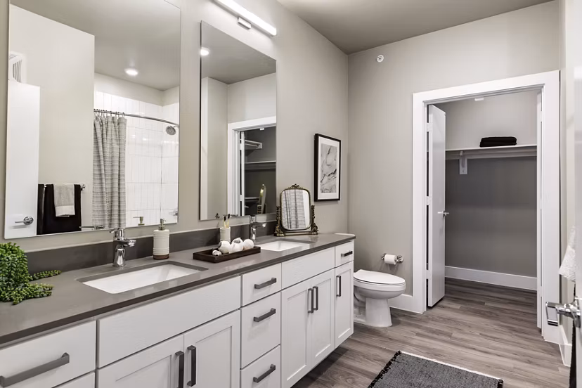 Modern bathroom with sleek fixtures at Urban East Apartments, offering luxury living in a prime location