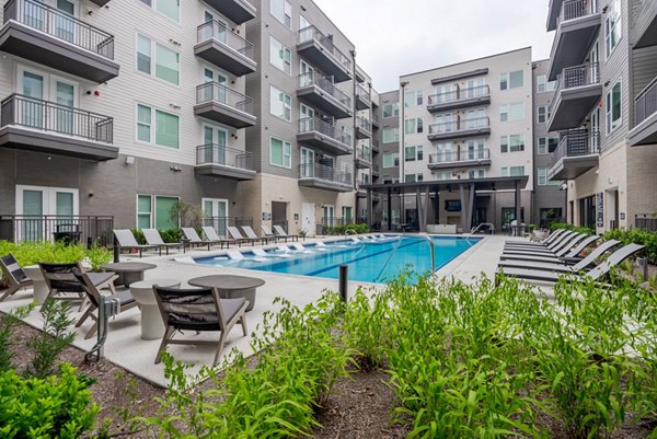 Luxurious courtyard pool at Urban East Apartments offering leisure and relaxation spot for residents