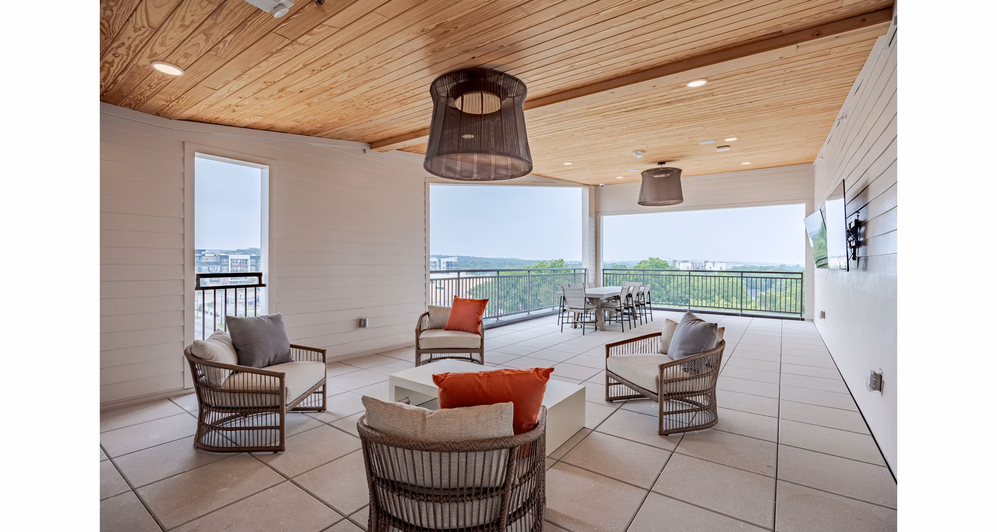 Lush courtyard with seating and gardens at Urban East Apartments offering a tranquil escape