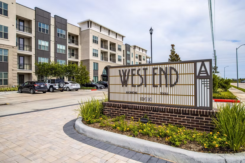West End Apartments: Stylish signage at luxury community in a prime location, showcasing modern apartment living