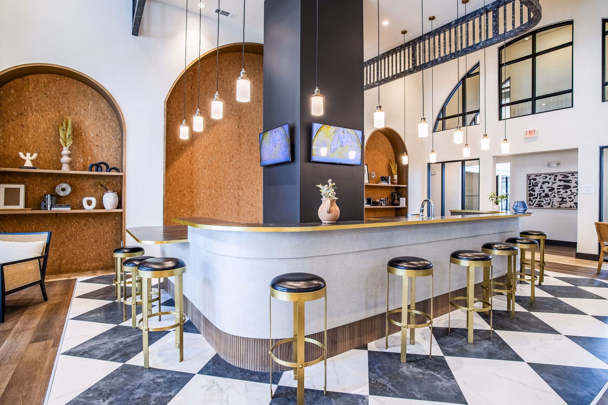 Clubhouse featuring modern design and comfortable seating at West End Apartments