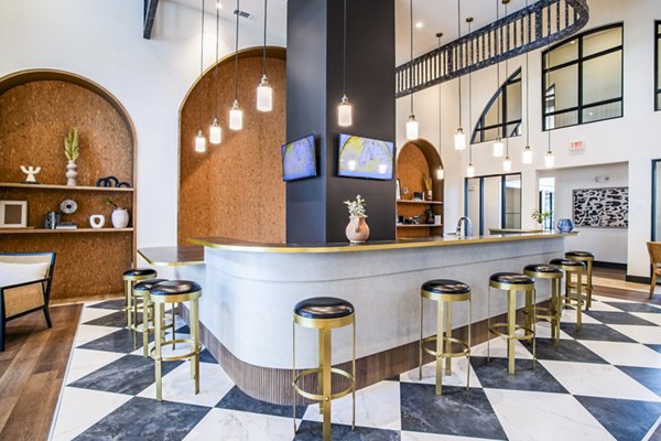 Clubhouse featuring modern design and comfortable seating at West End Apartments