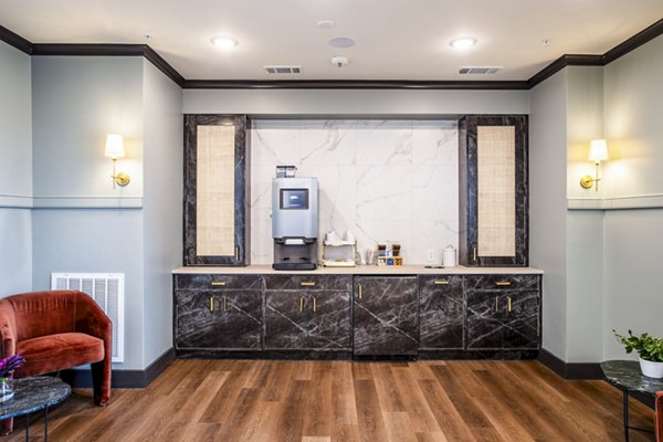 Elegant clubhouse lobby with modern decor at West End Apartments, offering luxury communal spaces in an upscale residential setting