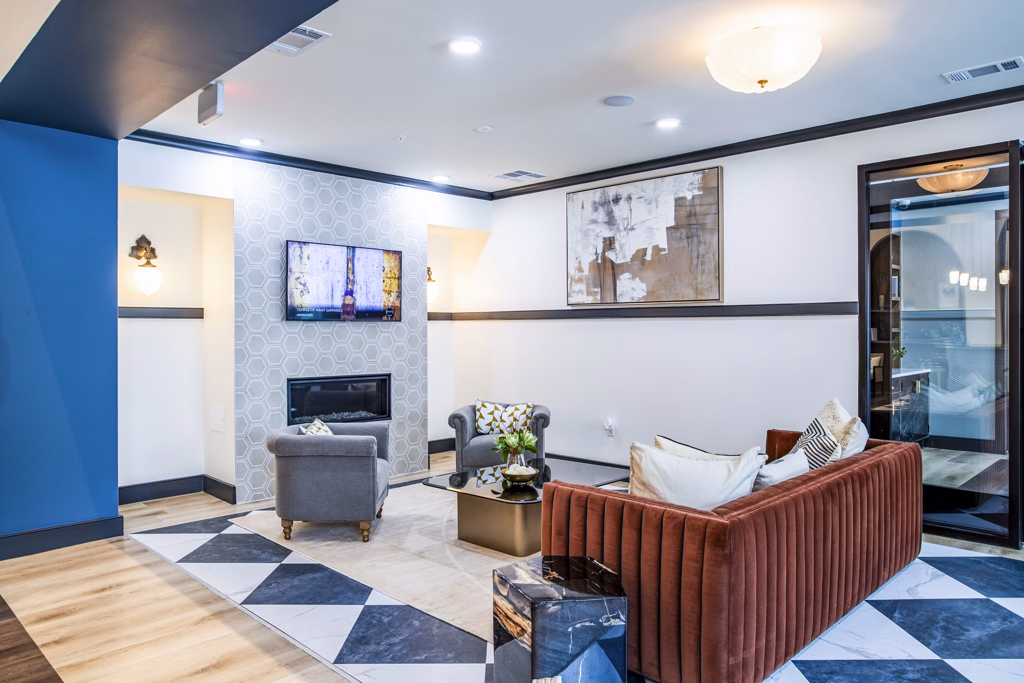 Elegant clubhouse lobby with modern seating and chic dÃ©cor at West End Apartments