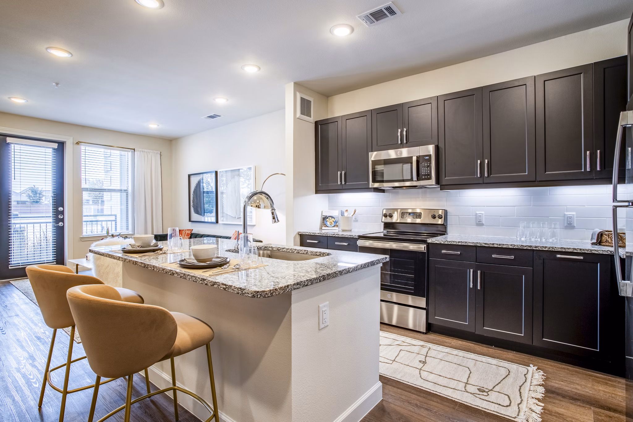 Dining room featuring elegant table setting at West End Apartments