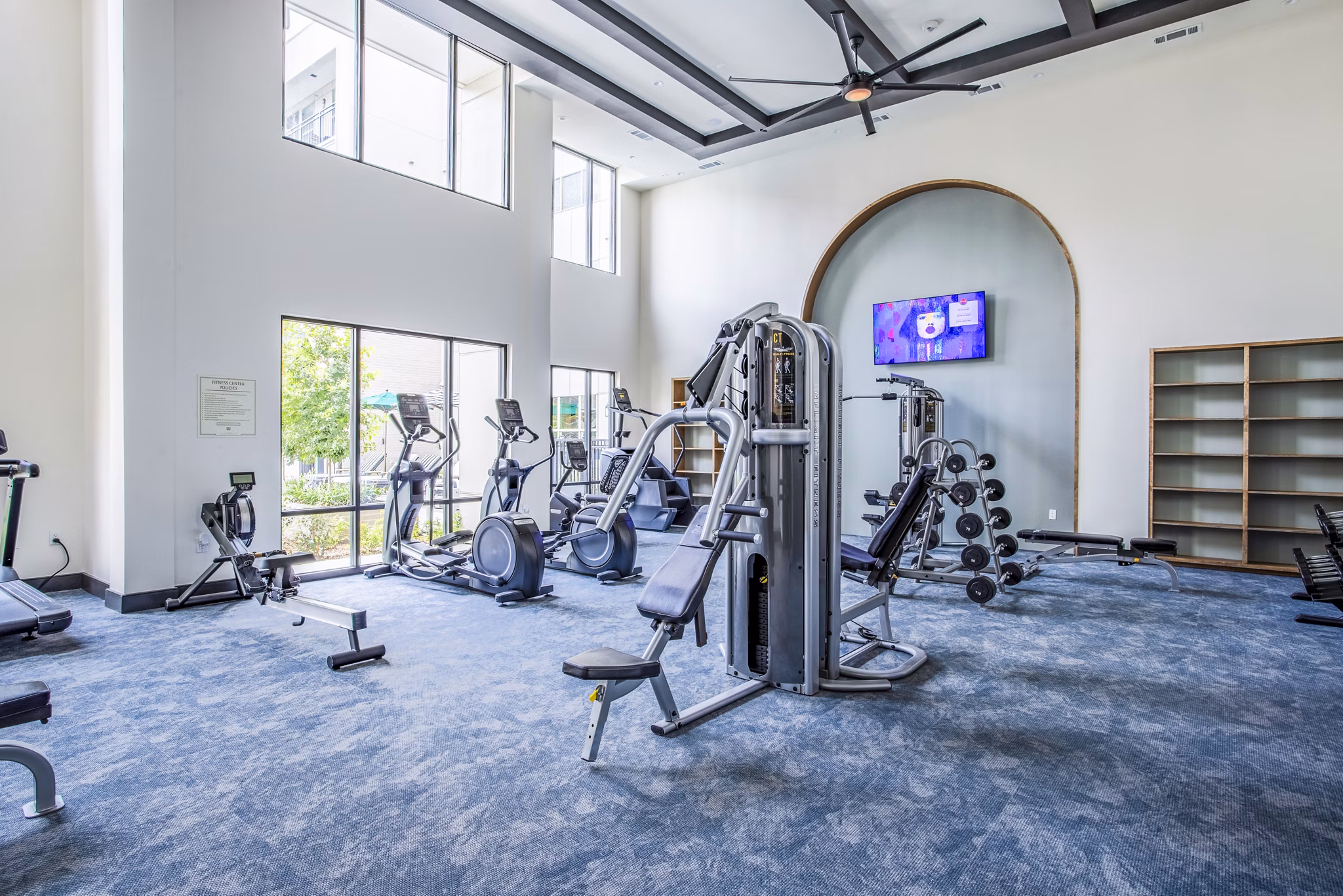 State-of-the-art fitness center with modern equipment at West End Apartments