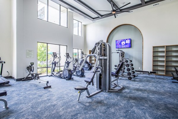 State-of-the-art fitness center with modern equipment at West End Apartments