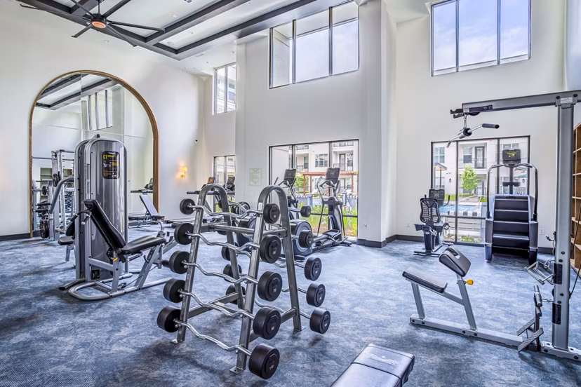 State-of-the-art fitness center with modern equipment at West End Apartments for luxury living