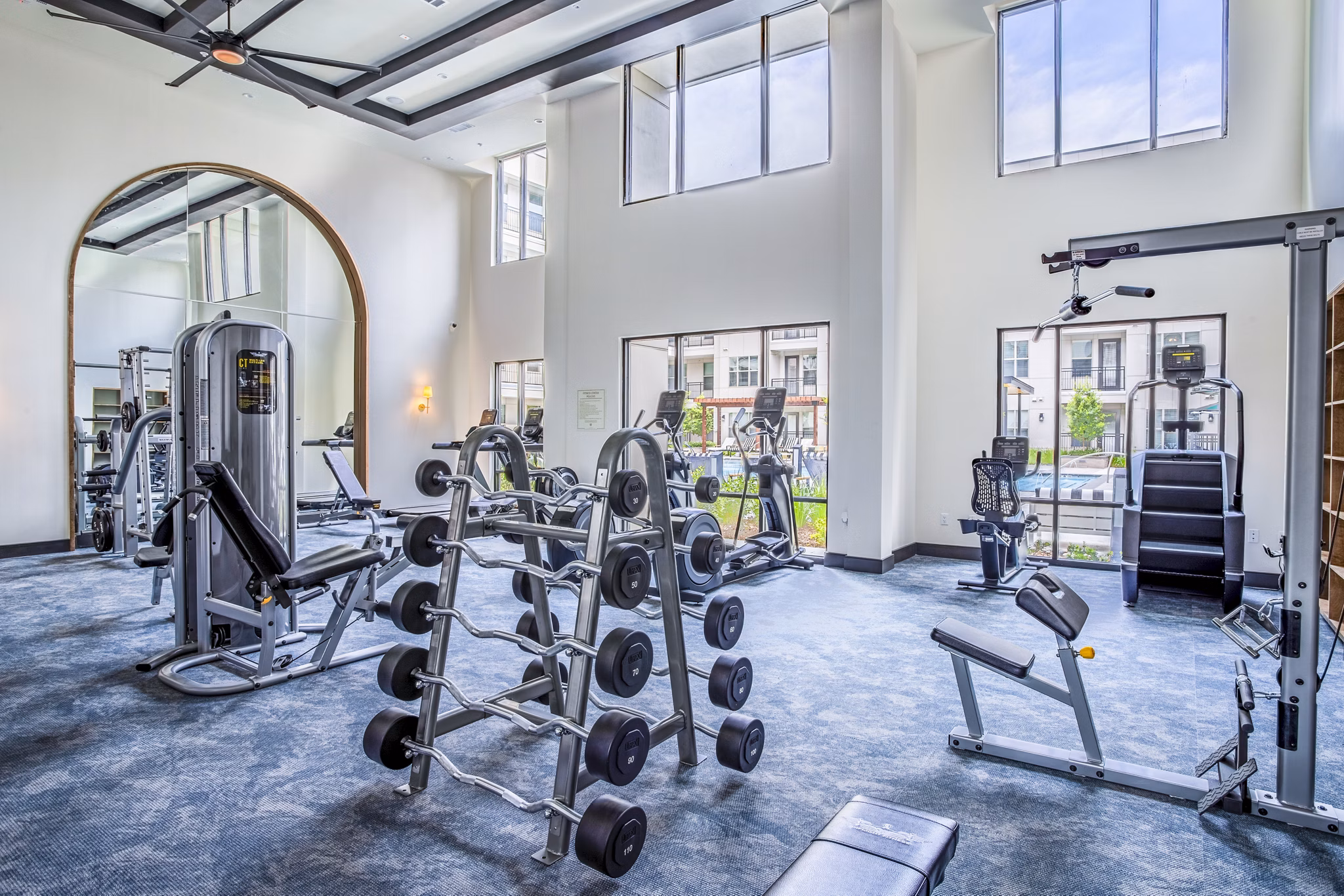 State-of-the-art fitness center with modern equipment at West End Apartments for luxury living