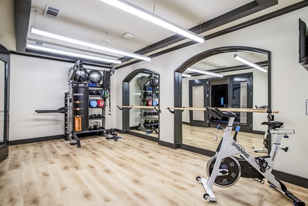 Bright yoga and spin studio with modern equipment at West End Apartments