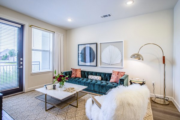Cozy living room with modern furnishings in West End Apartments