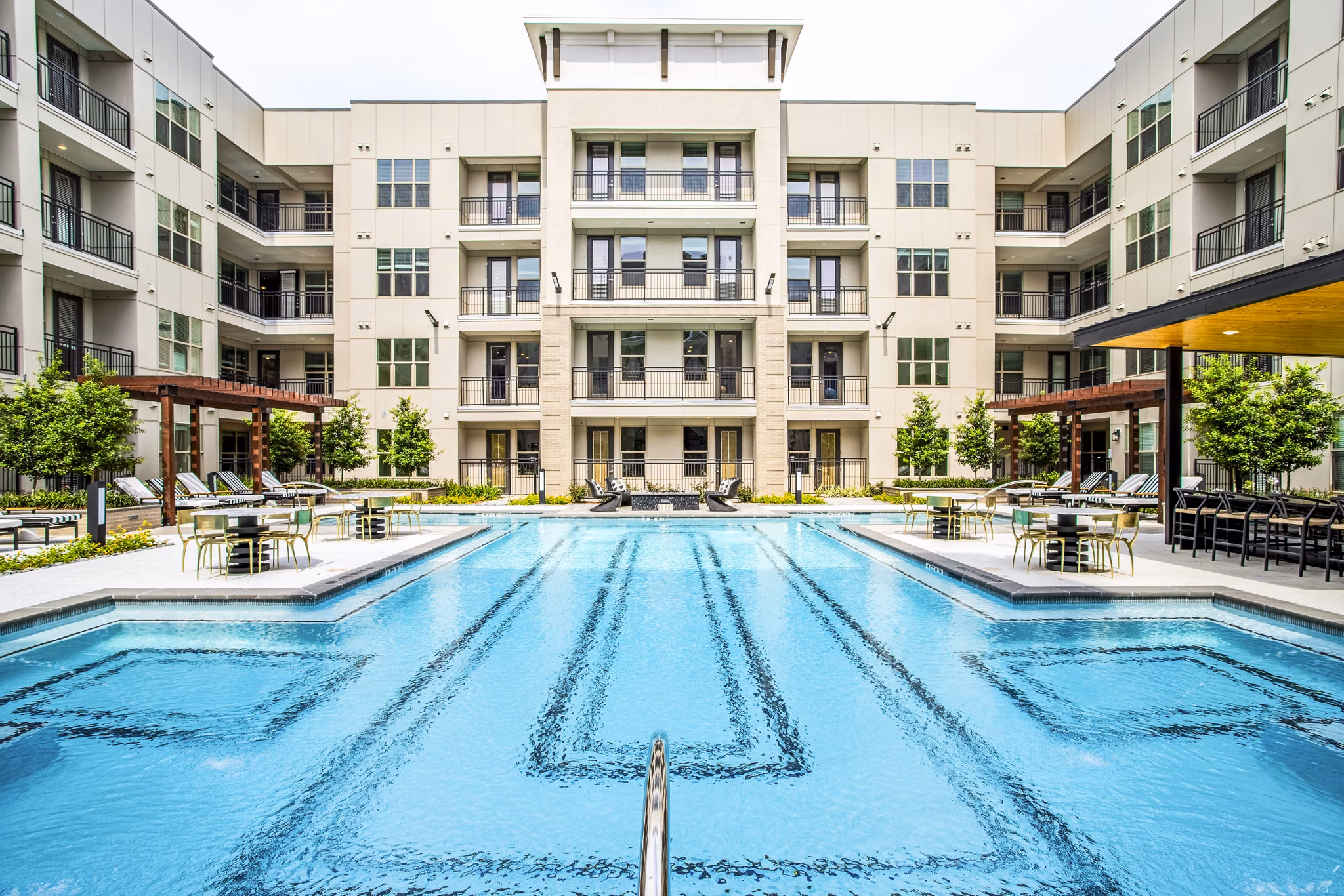 Inviting outdoor pool area at West End Apartments offering relaxation and leisure activities