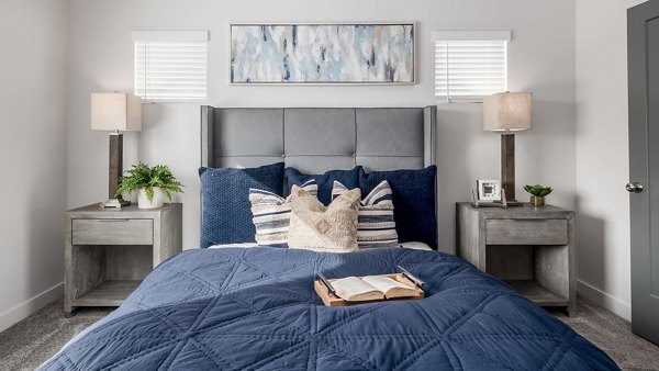 Cozy bedroom with modern decor at The Orchard Townhomes