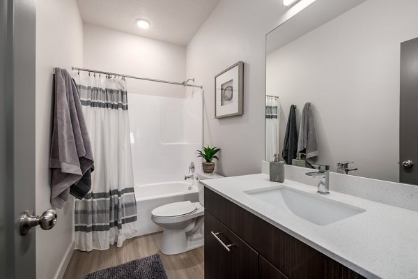 Modern bathroom with sleek fixtures at The Orchard Townhomes