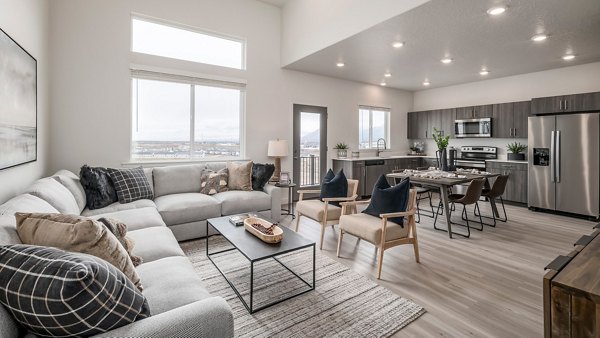 Spacious living room with contemporary decor in The Orchard Townhomes
