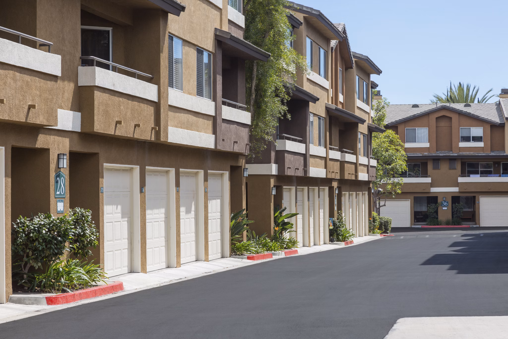 St Moritz Apartments: Modern building with parking garages in a luxurious residential community