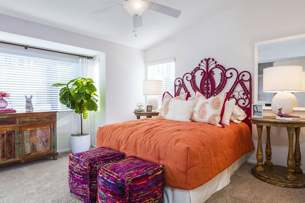 Cozy bedroom featuring elegant decor at St Moritz Apartments, a Greystar luxury community