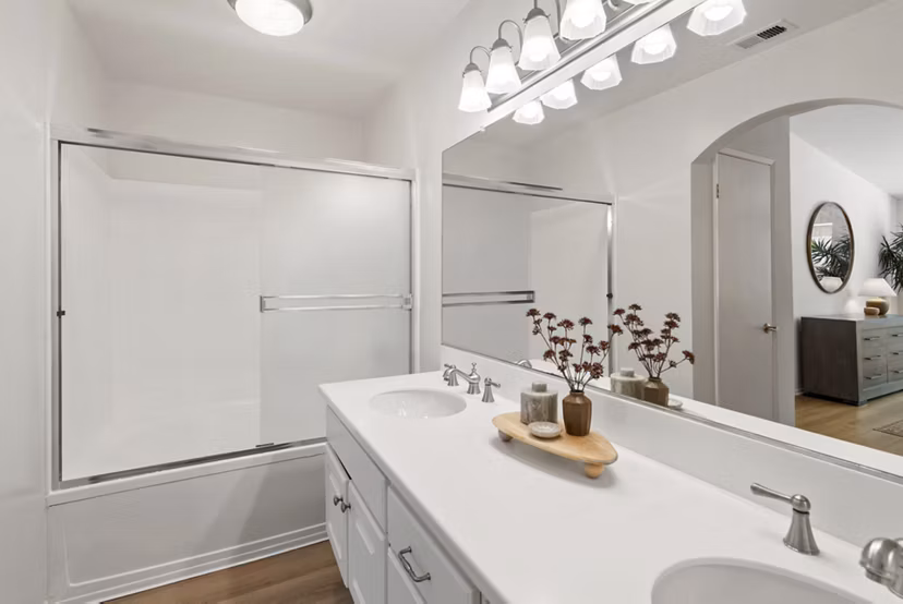 Bathroom closet with organized shelving in St Moritz Apartments