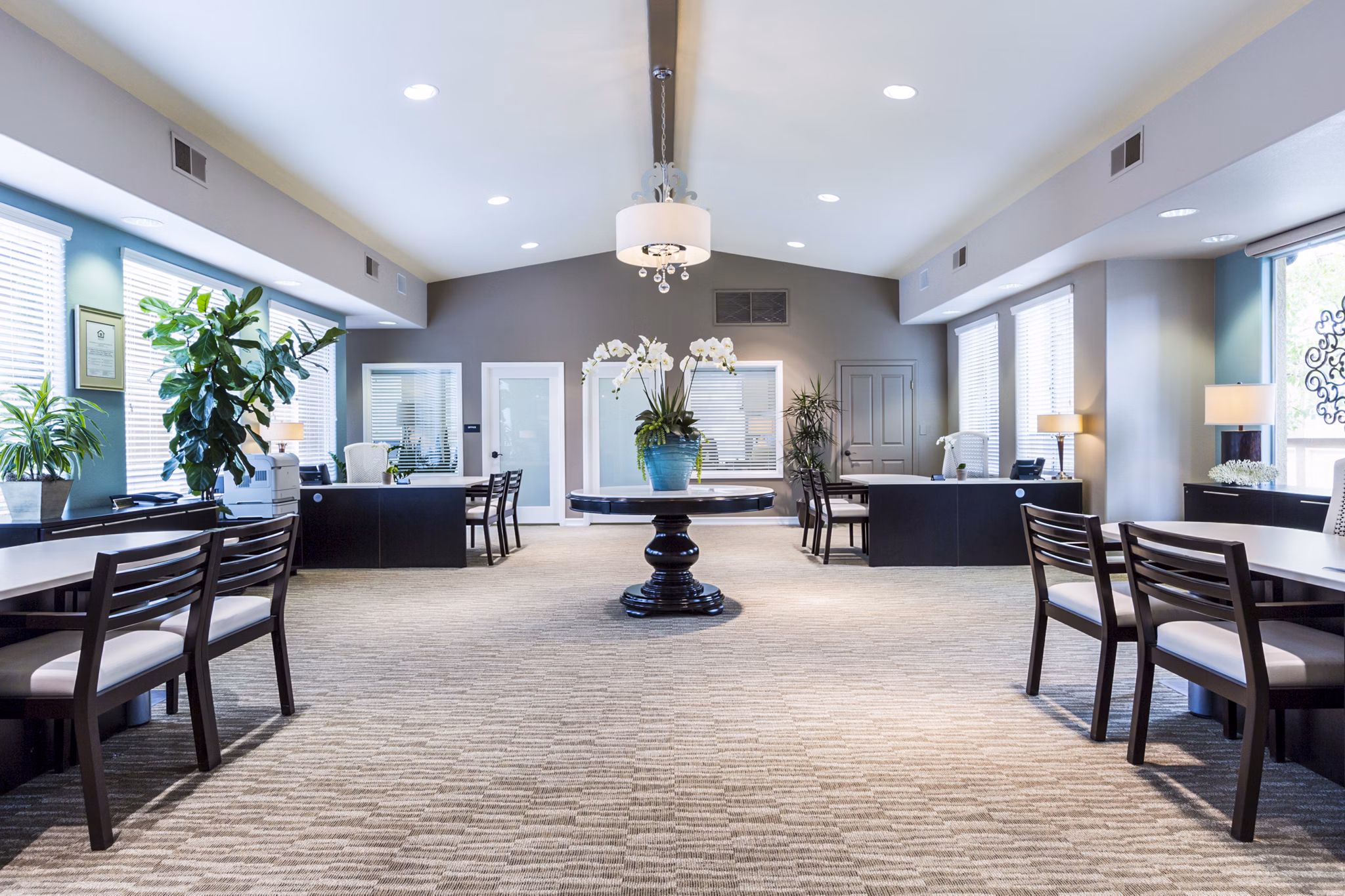 Modern clubhouse and leasing office with stylish decor at St Moritz Apartments