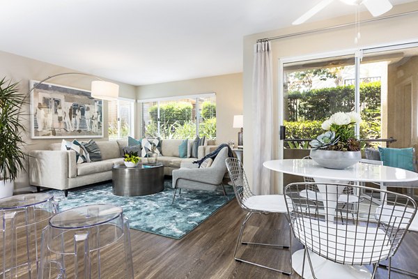 Dining area with modern furnishings at St Moritz Apartments: Luxurious Greystar property in prime location
