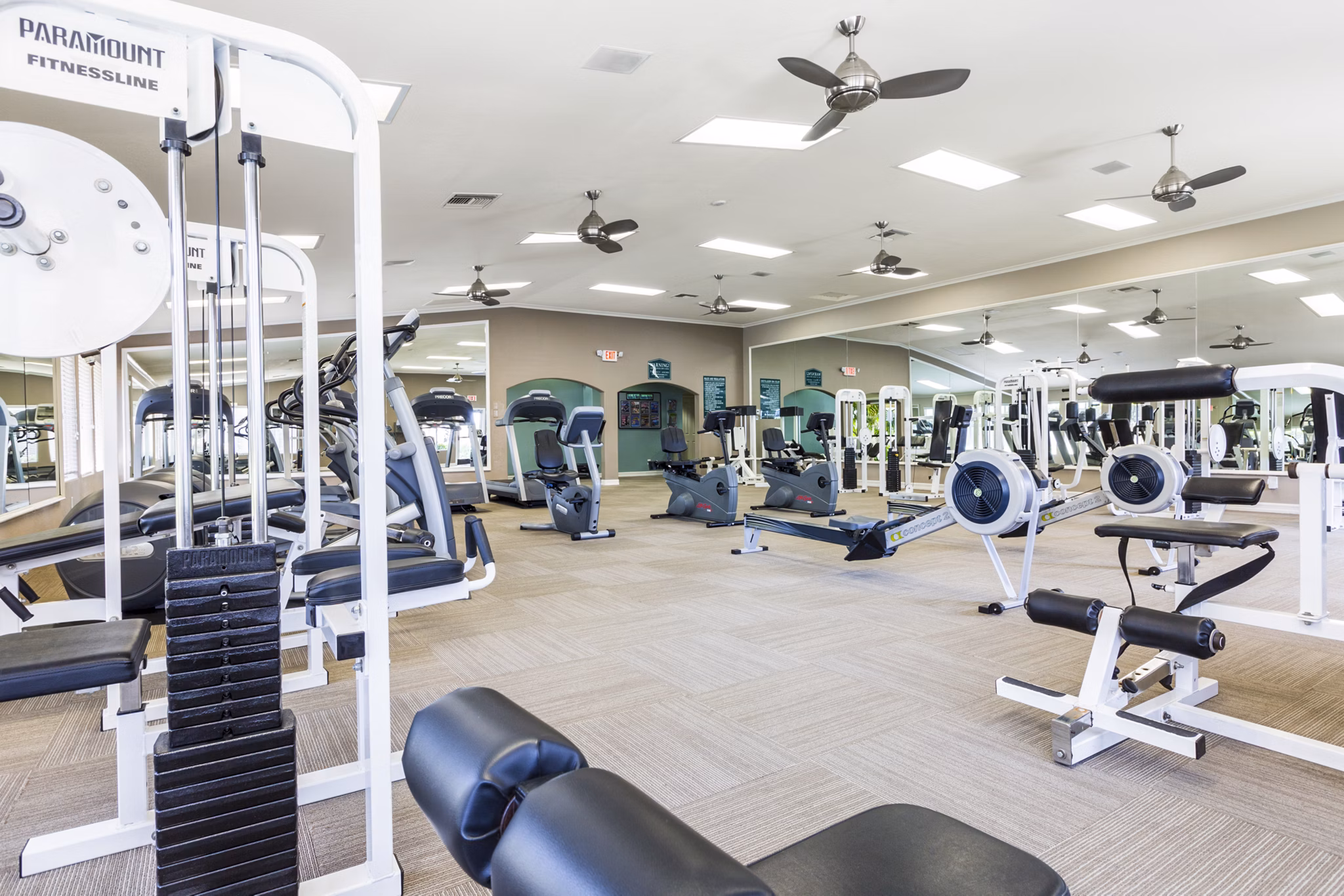 State-of-the-art fitness center with modern equipment at St Moritz Apartments