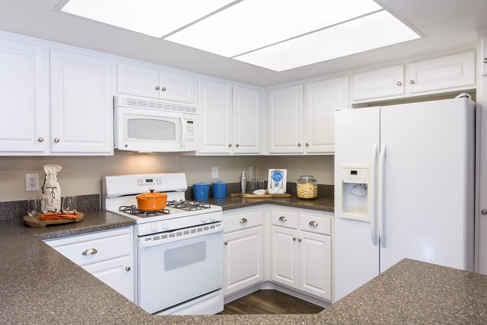 Modern kitchen with stainless steel appliances at St Moritz Apartments, a luxury living space by Greystar