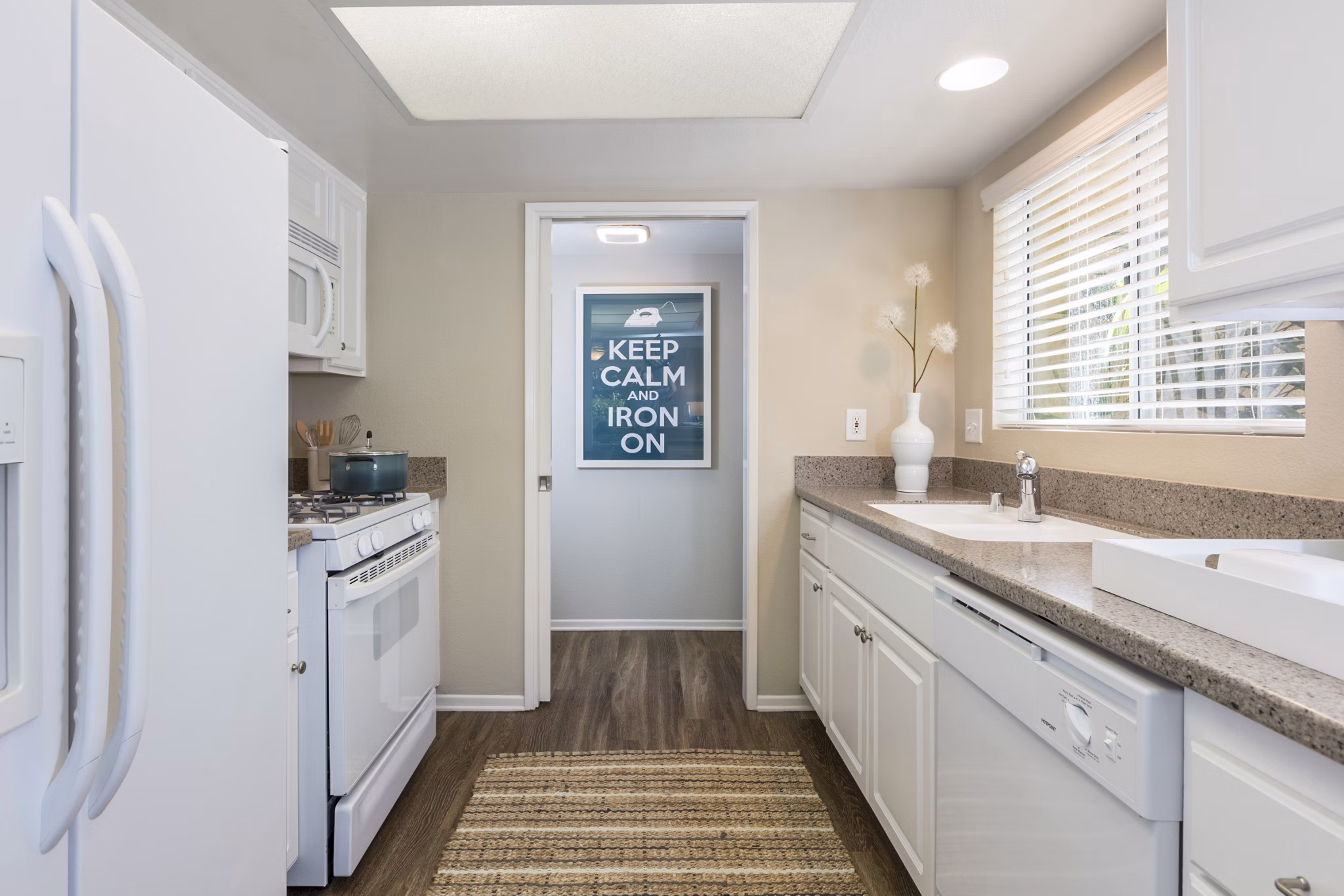 Stylish kitchen with modern appliances at St Moritz Apartments