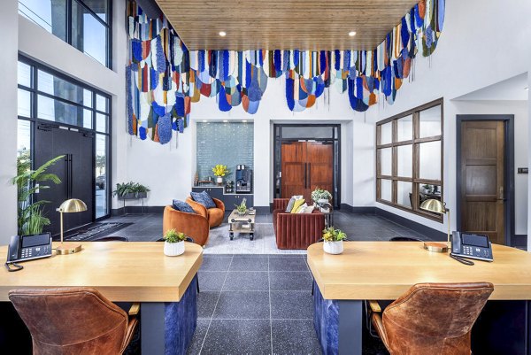 Clubhouse and leasing office at Broadstone Optimist Park Apartments, featuring modern design and welcoming spaces