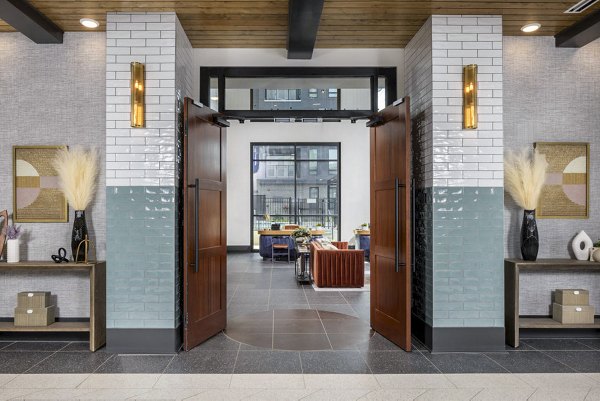 Clubhouse lobby featuring modern design elements at Broadstone Optimist Park Apartments