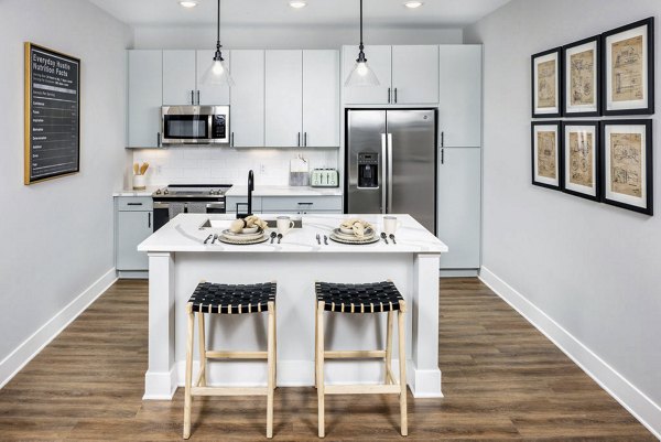 Modern kitchen with stainless steel appliances at Broadstone Optimist Park Apartments