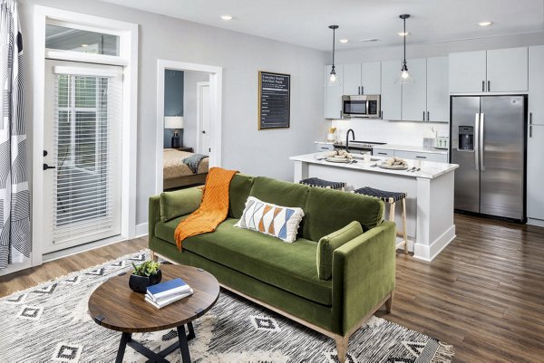 Cozy living room with modern decor at Broadstone Optimist Park Apartments