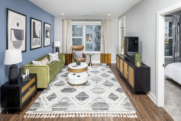 Spacious living room with modern decor at Broadstone Optimist Park Apartments