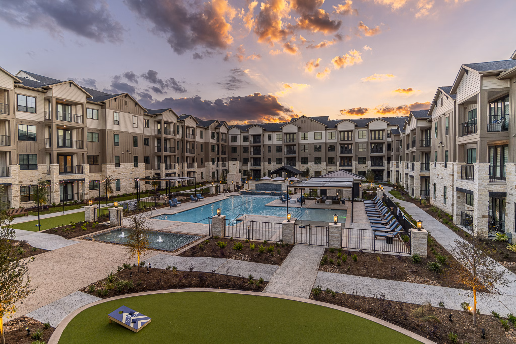 Resort-style pool at Cadence Creek at Towne Lake Apartments offering relaxation and leisure in a picturesque setting