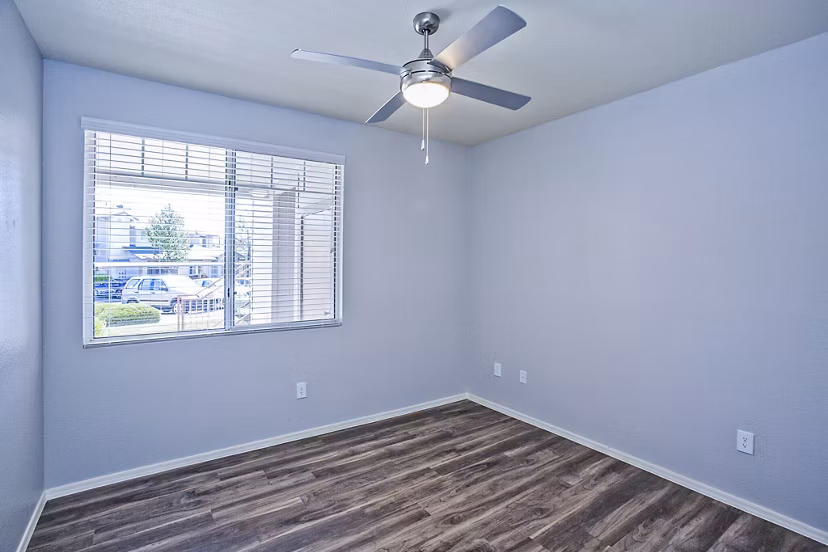 Modern bedroom with stylish decor in Legacy at Prescott Lakes Apartments