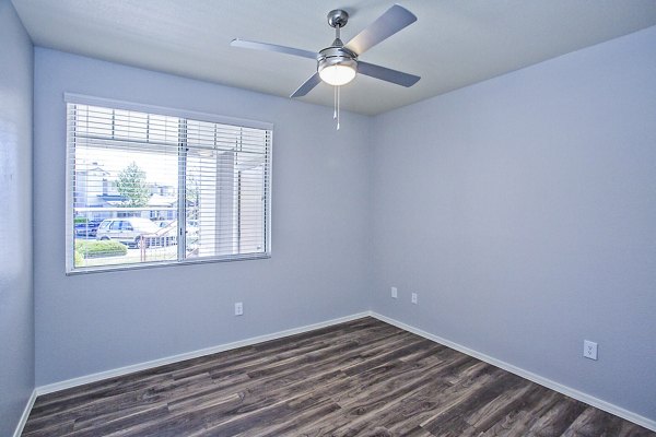 Modern bedroom with stylish decor in Legacy at Prescott Lakes Apartments
