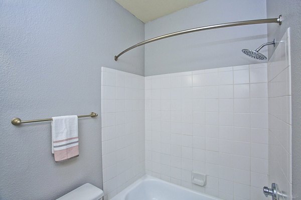 Legacy at Prescott Lakes Apartments: Modern bathroom with sleek fixtures and granite countertops, offering luxury living in a premium setting