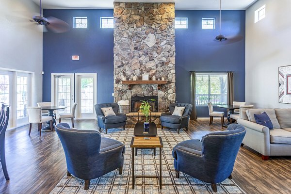 Clubhouse with modern design and cozy seating at Legacy at Prescott Lakes Apartments