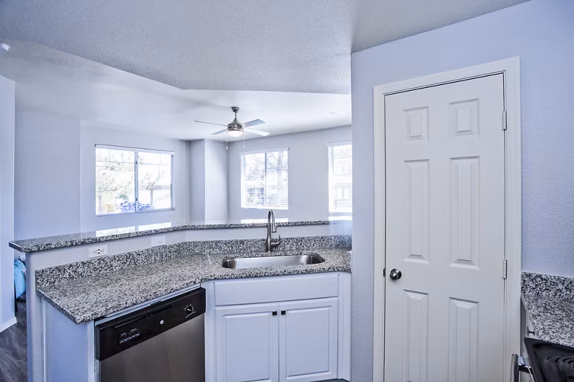 Modern kitchen with stainless steel appliances at Legacy at Prescott Lakes Apartments