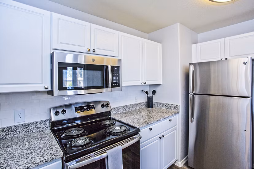 Modern kitchen featuring stainless steel appliances at Legacy at Prescott Lakes Apartments