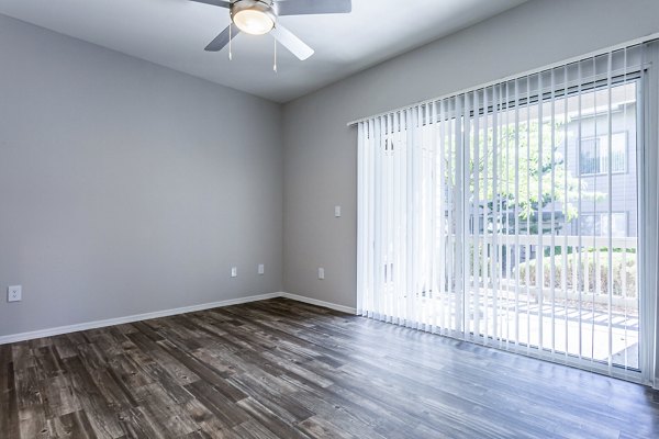 Spacious living room with elegant furnishings in Legacy at Prescott Lakes Apartments