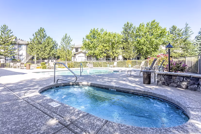 Luxurious hot tub at Legacy at Prescott Lakes Apartments featuring modern seating and ambiance