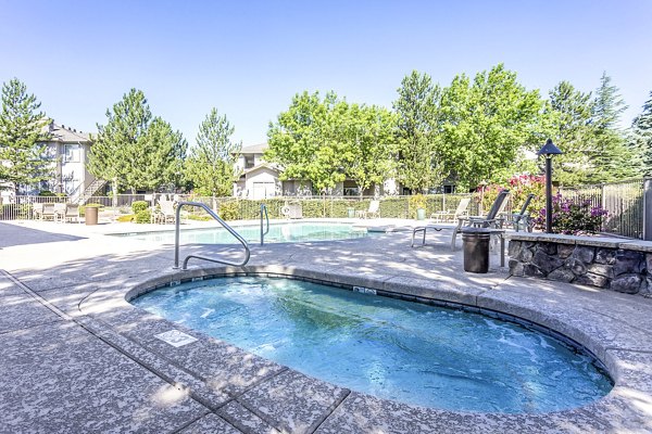 Luxurious hot tub at Legacy at Prescott Lakes Apartments featuring modern seating and ambiance