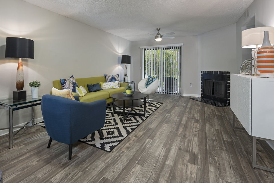 Spacious living room with modern furnishings at Four Lakes at Clearwater Apartments
