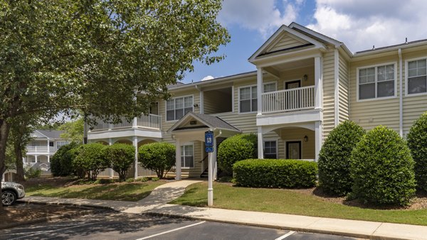 Landings at Sweetwater Creek: Elegant view of luxury apartments in Austell, showcasing modern architecture and manicured landscaping