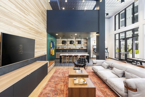 Clubhouse featuring modern design and ample seating at Assembly Apartments
