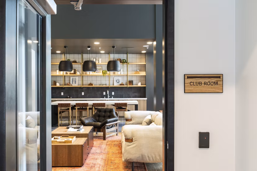 Assembly Apartments: Modern clubhouse featuring stylish design and gathering spaces