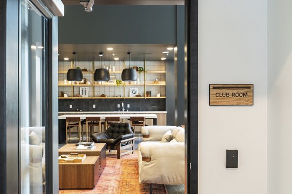 Assembly Apartments: Modern clubhouse featuring stylish design and gathering spaces