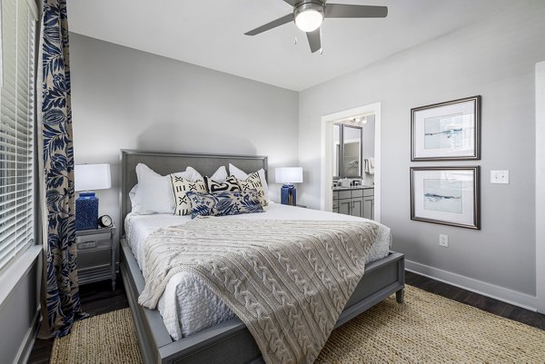 Modern bedroom with sleek design and natural light at Element Barclay Station luxury apartments